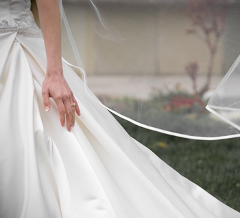 Bride in wedding gown at backyard wedding in Wisconsin