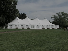 Pole tent rental with sidewalls